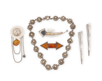 A group of silver jewelry