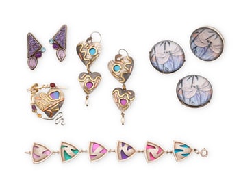 A group of silver and stone set jewelry