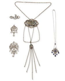 A group of vintage silver jewelry