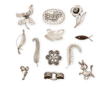 A group of Mexican silver brooches