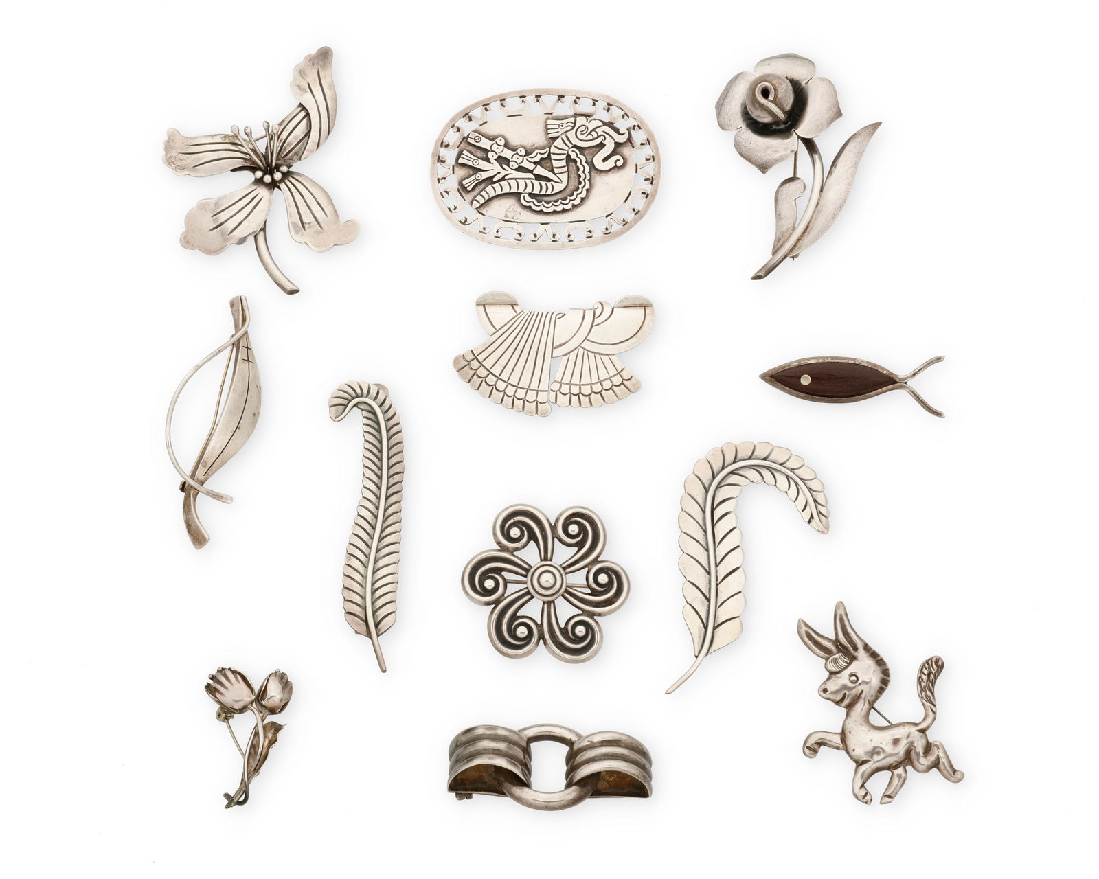 A group of Mexican silver brooches (1 of 2)