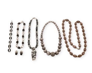 A group of silver jewelry