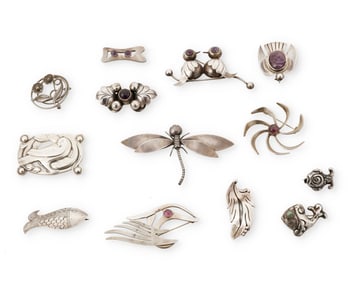 A group of Mexican silver brooches