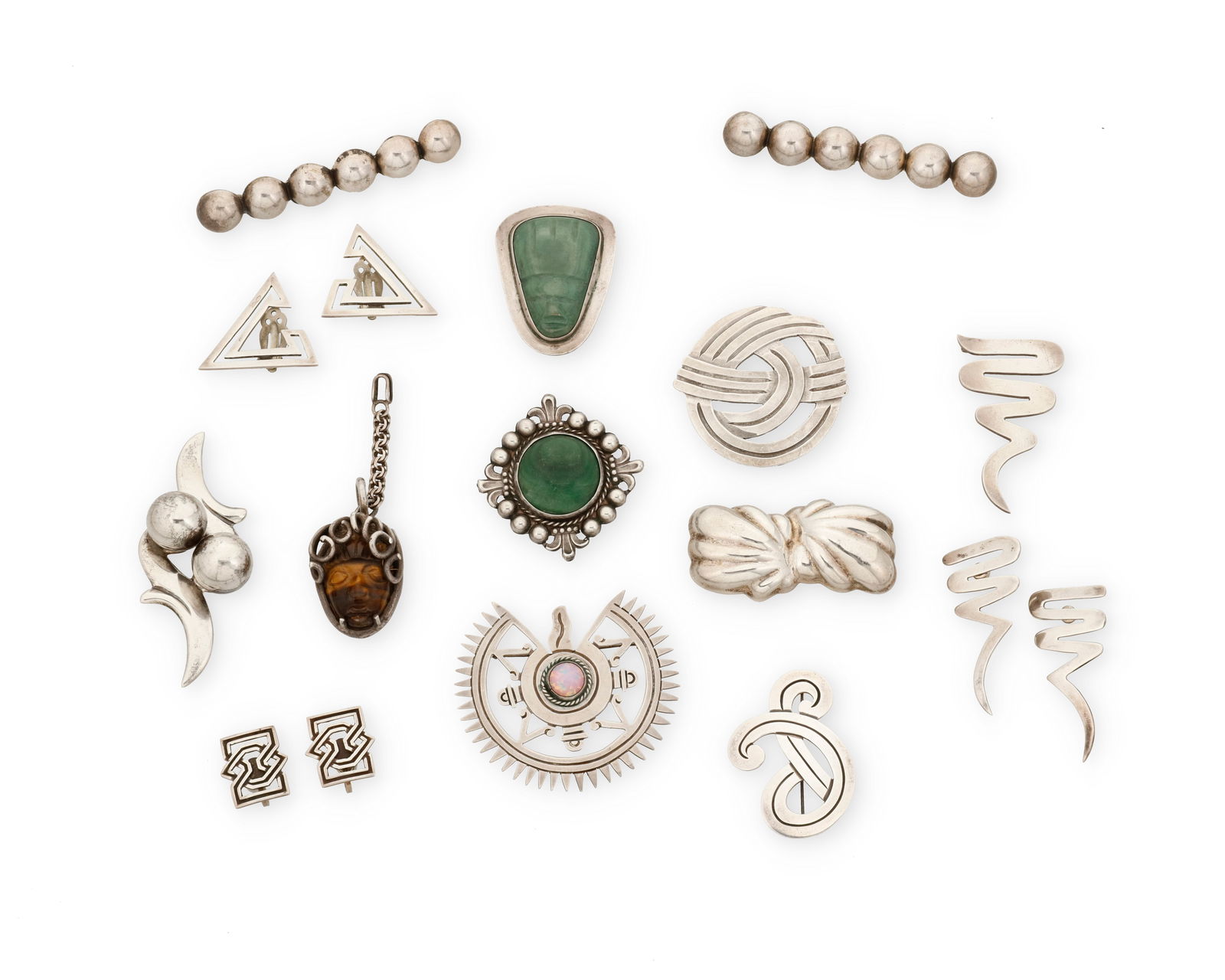 A large group of Mexican silver and hardstone jewelry: A large group of Mexican silver and hardstone jewelryMid-20th centuryEach variously stamped for Mexico and for Sterling; seven further variously stamped for maker and design numberFourteen works compr