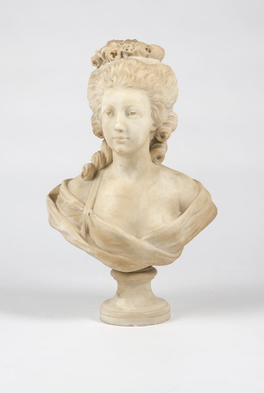 A Continental carved white marble bust of a woman: Late 19th century, inscribed 'Lenhoir', depicted gazing dexter, wearing an 18th century style coiffure adorned with flowers, her shoulders half-draped, mounted on a waisted circular socle, 26'' H x 17