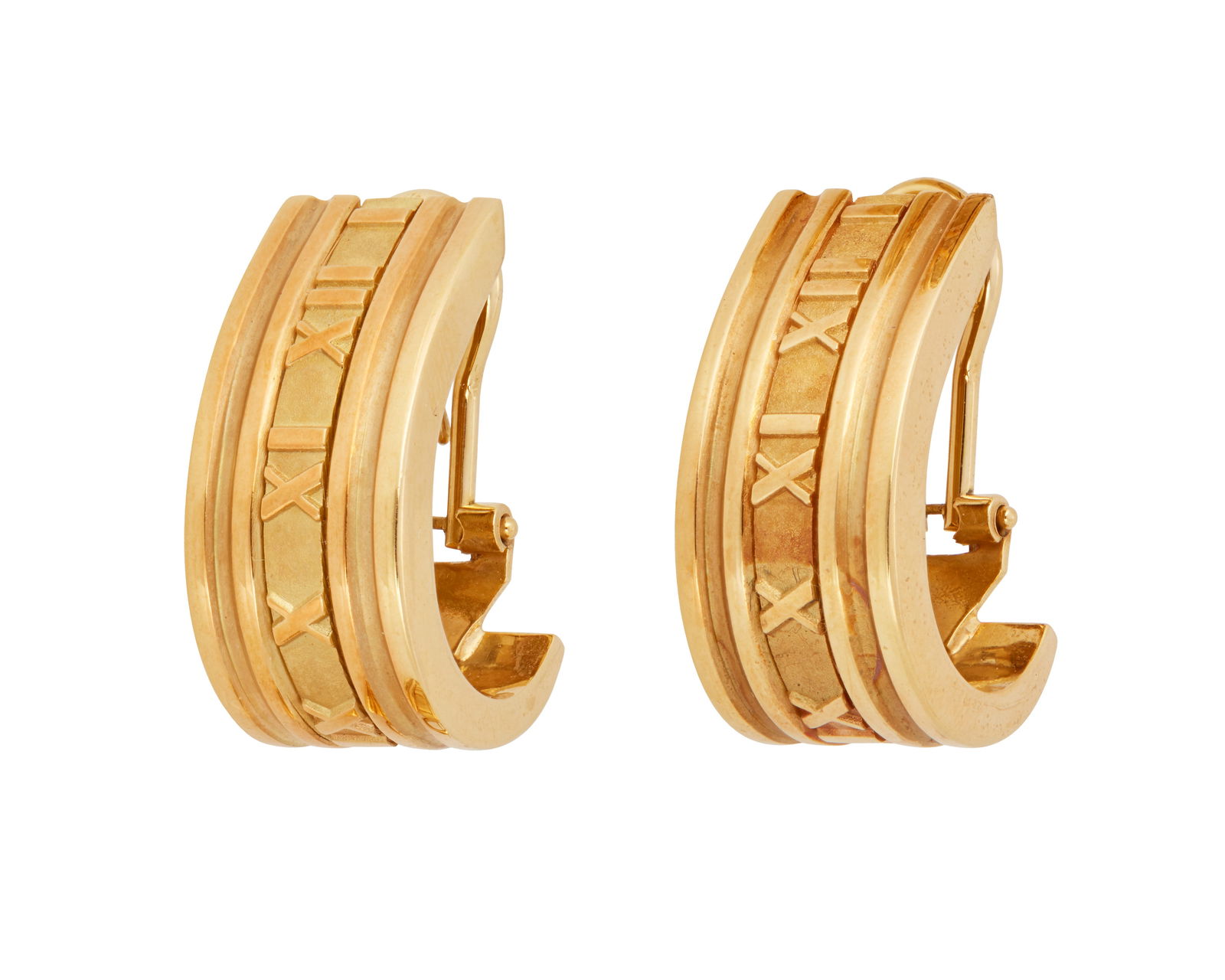 Tiffany & Co.: A Pair of 18K Gold "Atlas" Earclips: Tiffany & Co.: A Pair of 18K Gold "Atlas" EarclipsEach featuring a row of Roman numerals, signed Tiffany & Co., 1995, Italy, with signed box2 piecesMeasures: 1 1/8 in.16.8 grams grossPropert