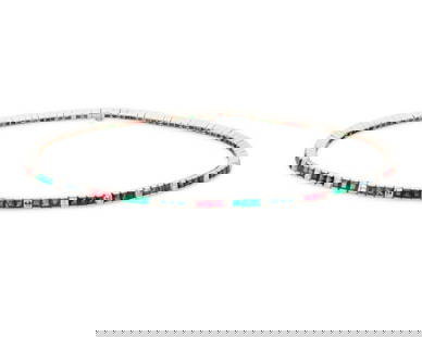 Mauboussin: A Platinum, Emerald, Sapphire and Diamond Necklace: Mauboussin: A Platinum, Emerald, Sapphire and Diamond NecklaceFeaturing alternating segments of square-cut emeralds, rubies and sapphires accented by thirty square-cut diamonds weighing approximately