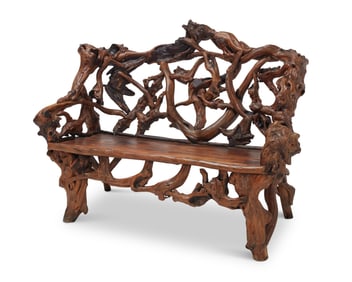 A rustic natural burlwood settee