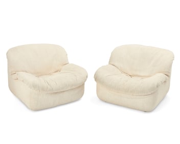 A pair of postmodern scoop chairs