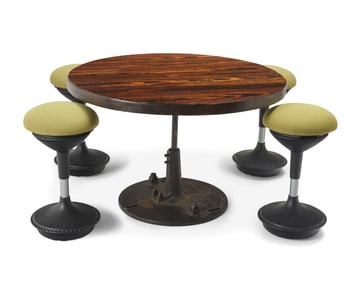 An industrial dining table and four stools