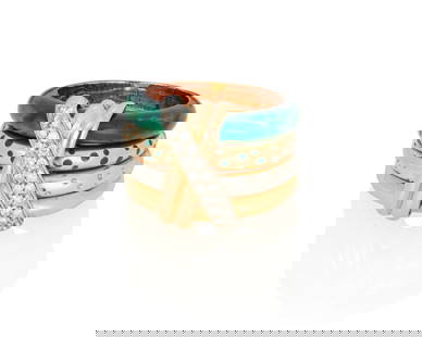 La Nouvelle Bague: An 18K Bi-Color Gold, Enamel and Diamond Ring: La Nouvelle Bague: An 18K Bi-Color Gold, Enamel and Diamond Ring Featuring four white and yellow gold bands of varying designs accented with green enamel and round diamonds, signed la Nouvelle Bague 
