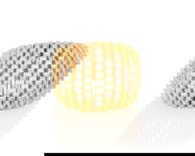 David Yurman: An 18K Gold and Diamond Ring: David Yurman: An 18K Gold and Diamond Ring Featuring multi-row design of twisted gold rope accented by round diamonds, signed D.Y. Sise: 5 1/2 18.4 grams gross