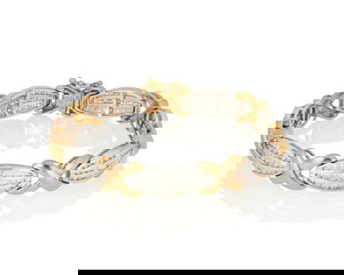 A 14K Bi-Color Gold and Diamond Bracelet: A 14K Bi-Color Gold and Diamond Bracelet Featuring "X" designs accented by graduated links featuring round diamonds weighing approximately 3.30 carats, signed F.D. Length: 7 1/2 in. 22.5