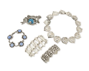 A Group of Ornate Mexican Silver Jewelry