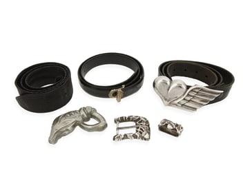 A Group of Belt Buckles and Leather Belts