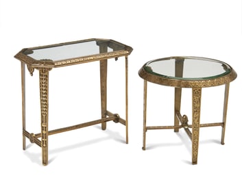 Two Art Deco-style cast brass side tables