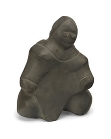An Inuit carved stone figure