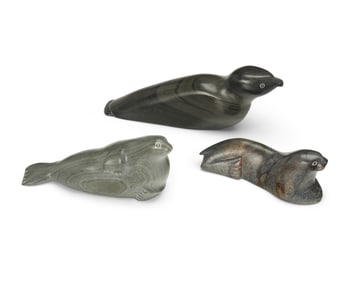 Three Inuit carved stone animal figures