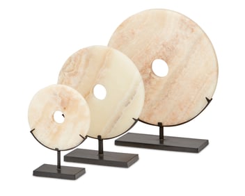 Three onyx disc table items