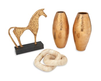 A group of decorative table items