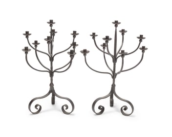 A pair of wrought iron candelabra, 20th century