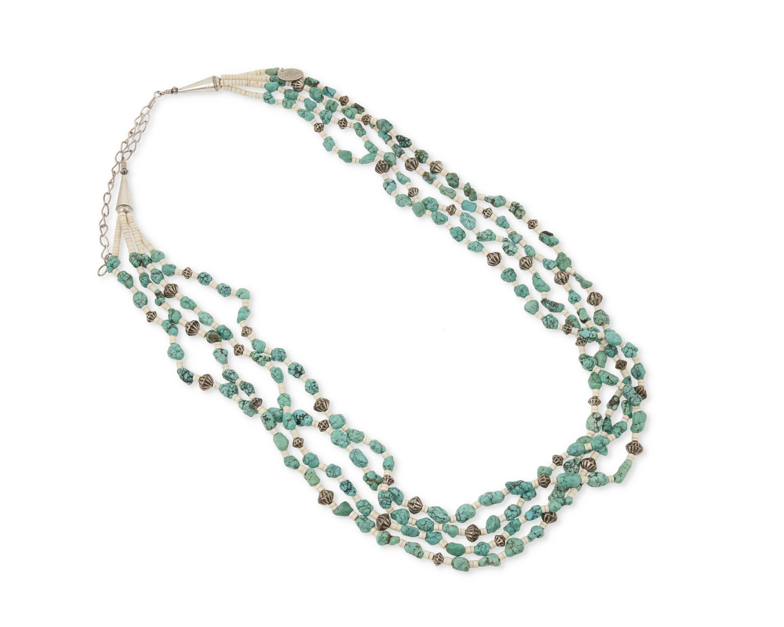 An Audie Yazzie Navajo award-winning turquoise necklace: An Audie Yazzie Navajo award-winning turquoise necklaceAudie Yazzie (b. 20th century, Dine)Late 20th centuryMarked to hangtag: Audie YazzieA four-strand necklace with turquoise, silver, and clam shell