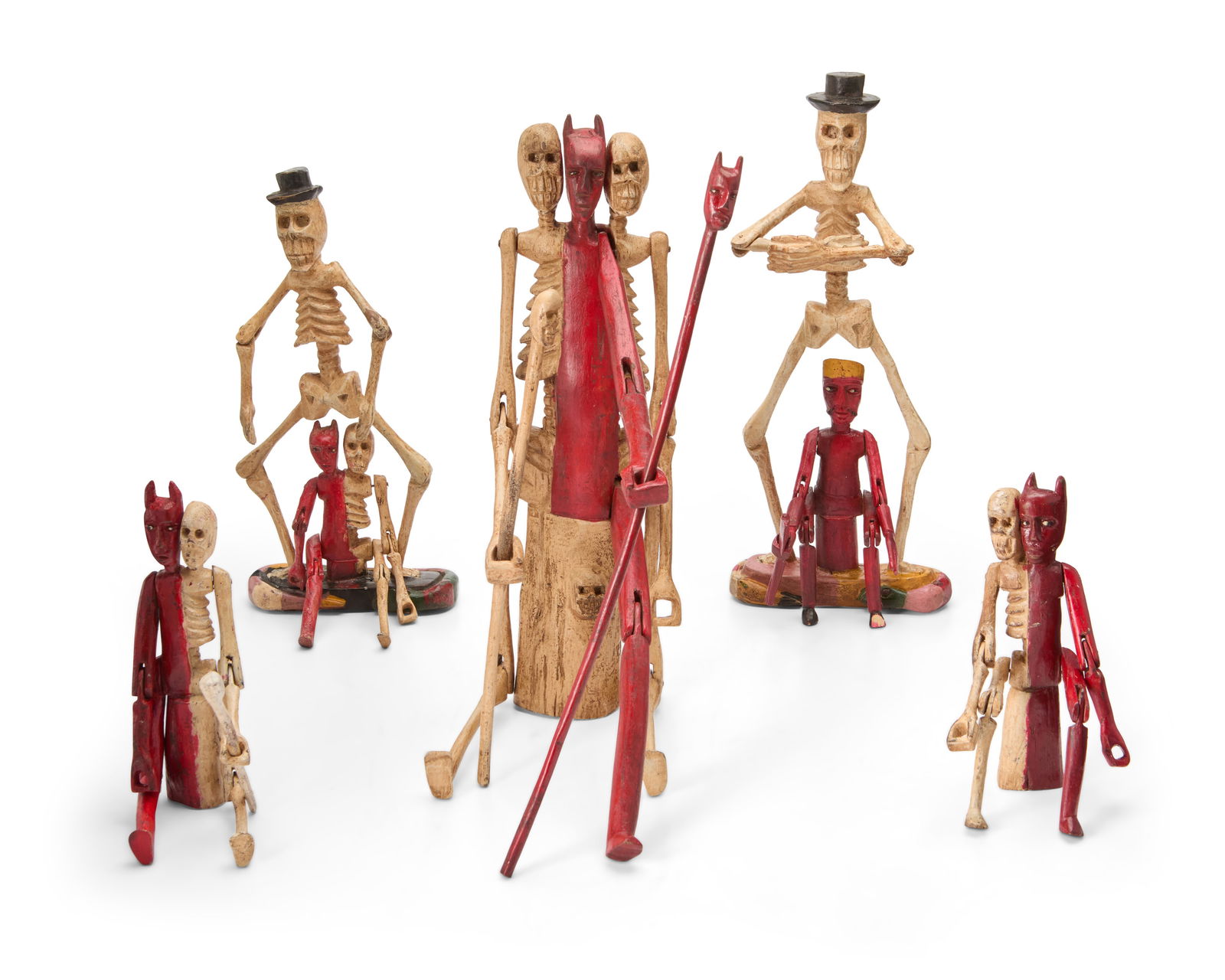 A group of Latin American folk art skeleton and devil figures (1 of 4)