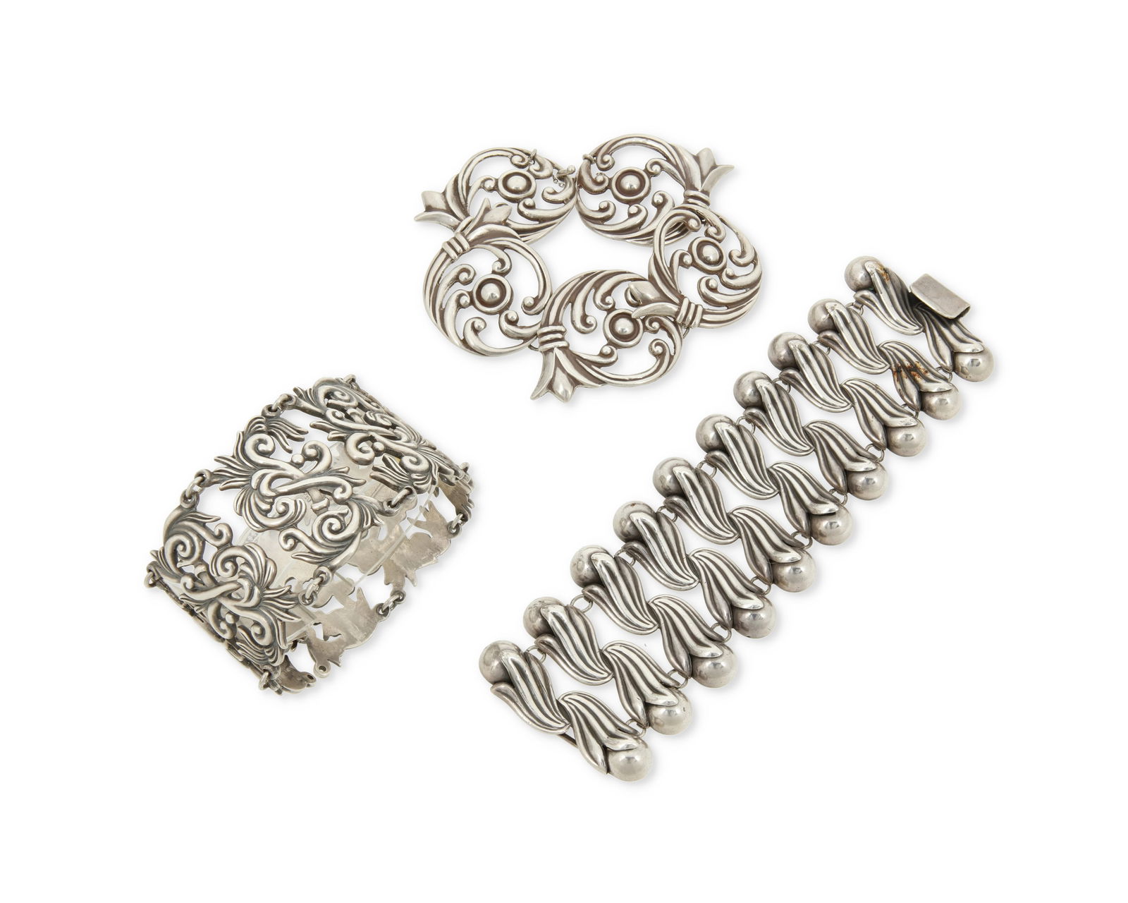 A group of Los Castillo Mexican silver link bracelets: A group of Los Castillo Mexican silver link braceletsCirca 1940-1945 and 1948-1962; Taxco, MexicoEach variously stamped: Los Castillo / Taxco / Sterling / Made in Mexico / [Eagle 15] / [Design numbers