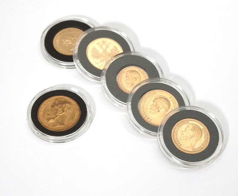 A collection of 6 Imperial Russia coins: 5 Alexander III Russian gold coins 1 Imperial Eagle coin (1) 1903 -5 Rouble. (2)1897- 7 Rouble (3)1903-10 Rouble. (4)1897-15 Rouble. (5) 1888- 5 Rouble. (6) 1874 5 Rouble Imperial Eagle, approximately