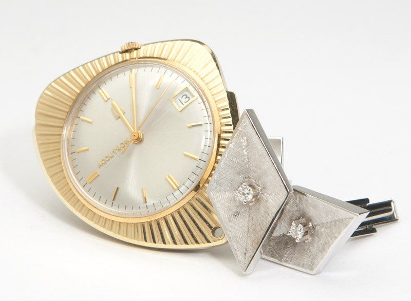 A set of gent's articles: 14K gold Accutron with Bulova movement open pocket watch with a pair of 14K white gold and diamond accent cufflinks, 58.5 gms gross, 3 pcs, est:$700/900