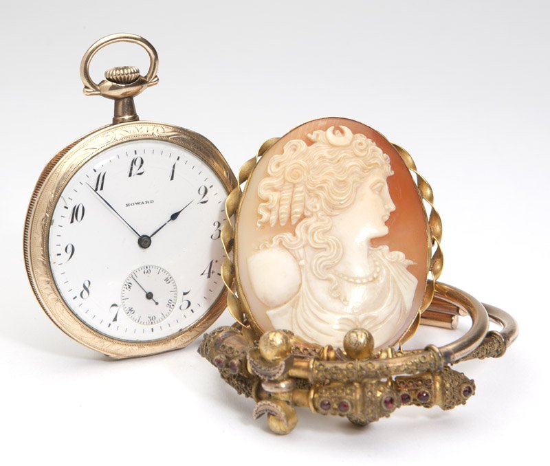 A group of gold-filled antique articles: A pair of bangles, a shell cameo brooch and a gold-filled pocket watch, dial signed Howard, 4 pcs, est:$200/400