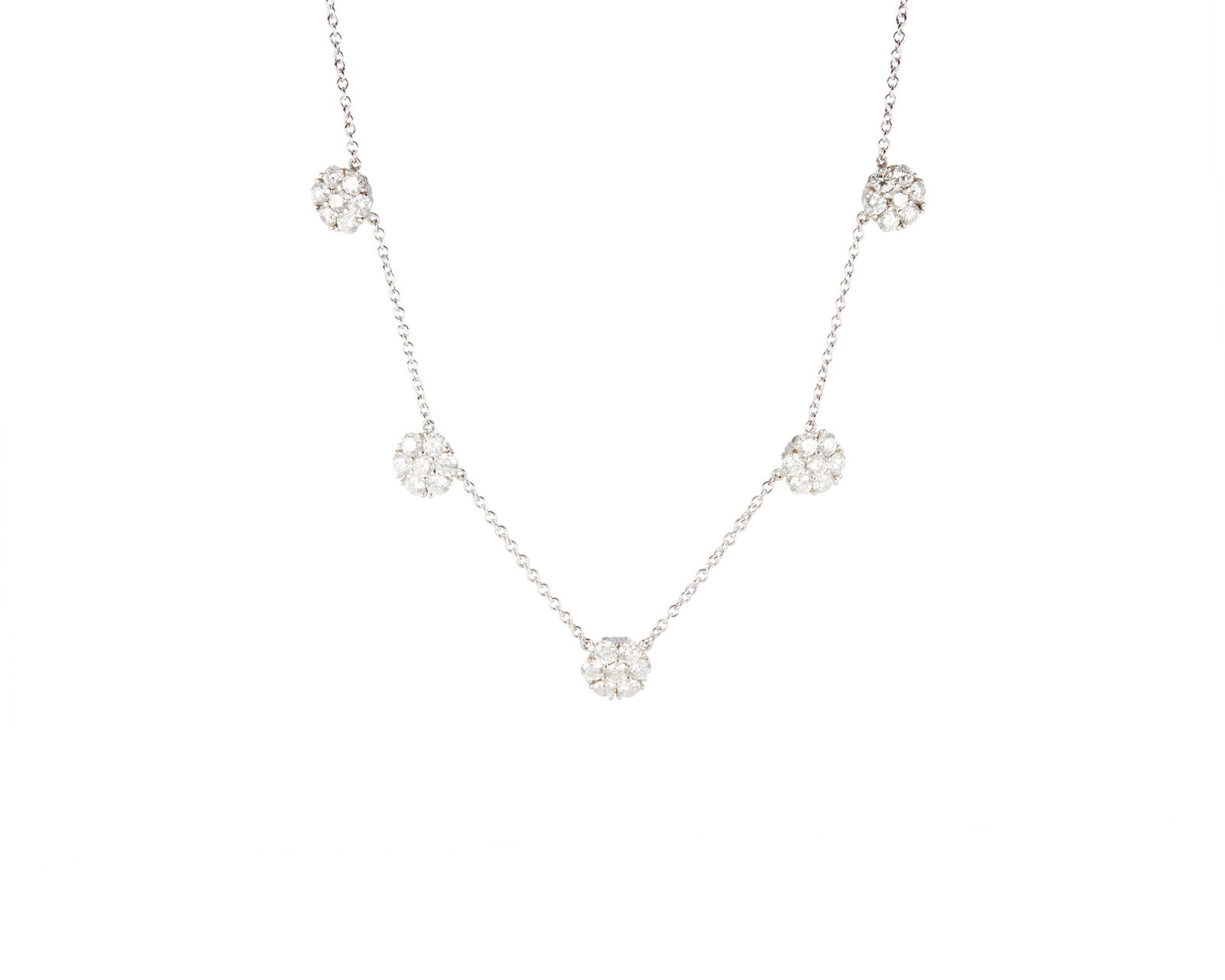 A 18K White Gold and Diamond Necklace: A 18K White Gold and Diamond NecklaceOf a floral design set with round diamonds weighing approximately 6.30 caratsLength: 16 in.15.7 grams gross