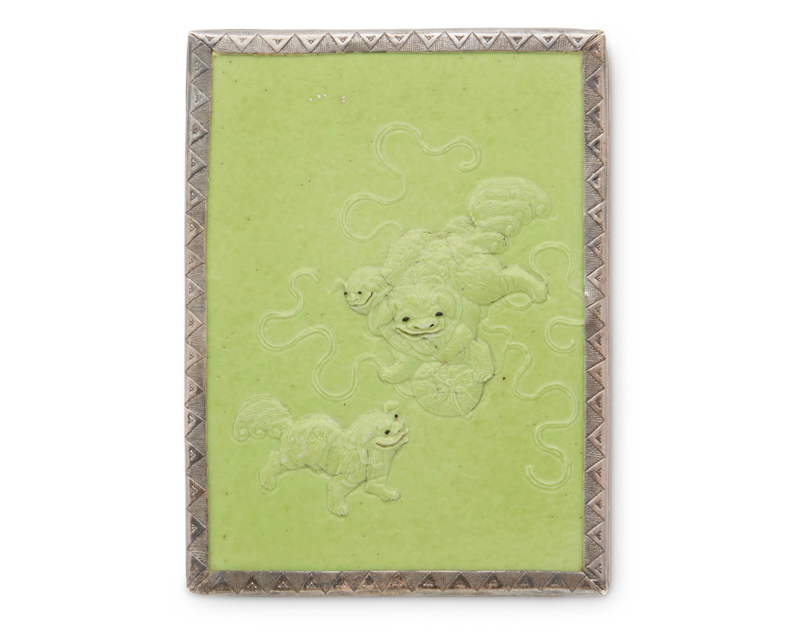 A Chinese carved porcelain plaque of guardian lions (1 of 4)