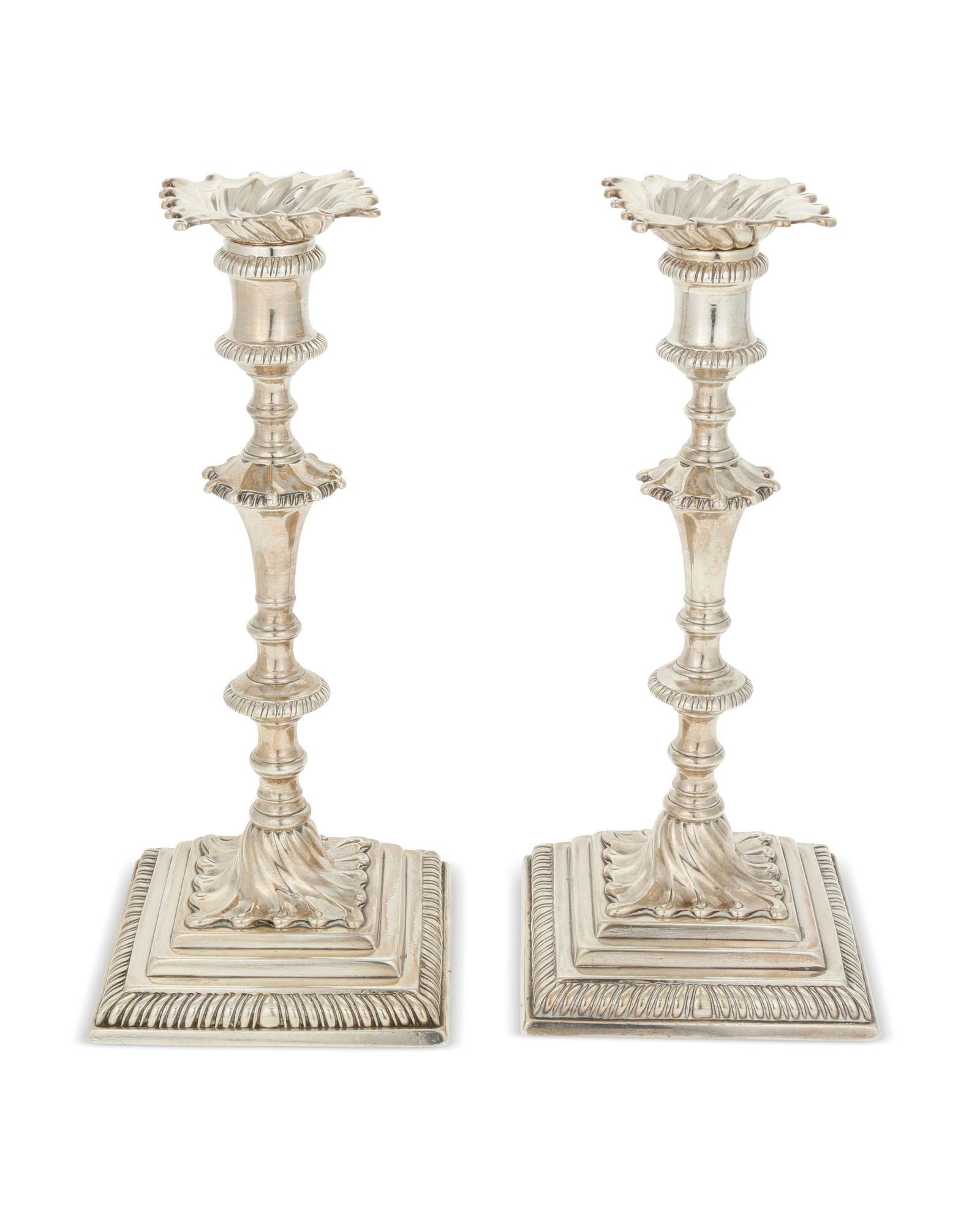 A pair of George III sterling silver candlesticks (1 of 4)