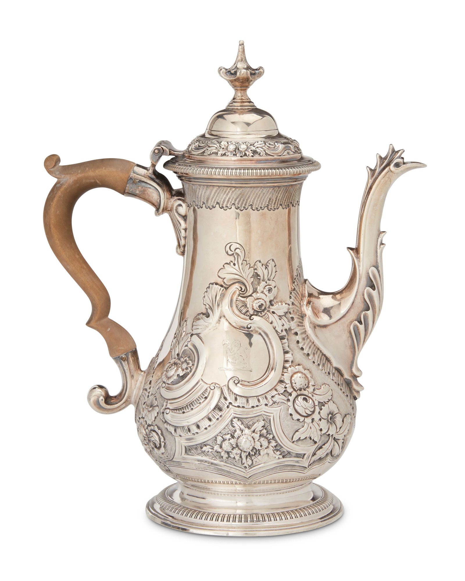 A George II sterling silver coffee pot: A George II sterling silver coffee pot1769; EnglandWith date mark and hallmarks for sterling and for London; maker's mark likely reading: TK (Thomas Kendrick)The hinged pot with rocaille and floral re