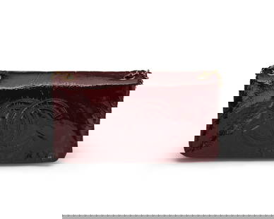 CHANEL: A Burgundy Patent Rock and Chain CC Flap Handbag: CHANEL: A Burgundy Patent Rock and Chain CC Flap Handbag Circa 2006-2008; France Marked to interior: Chanel / Copr / Made in France; tag and card: 11482057 A narrow dark red light crinkled patent