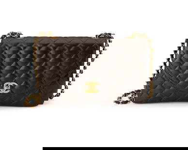 CHANEL: A Vintage Brown Diamond Quilted Half Moon Flap Bag: CHANEL: A Vintage Brown Diamond Quilted Half Moon Flap Bag 1989-1991; France Marked to interior: Chanel / Copr / Made in France; tag and card: 1207967 A smooth brown calfskin quilted leather bag with