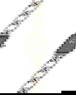CHANEL: A Premiere Gourmette Chain Wristwatch, 1987: CHANEL: A Premiere Gourmette Chain Wristwatch, 1987 Dial:†black-lacquered dial with no hour markers Case: stainless steel Strap: steel chain Model:†quartz Case number:†OE35501