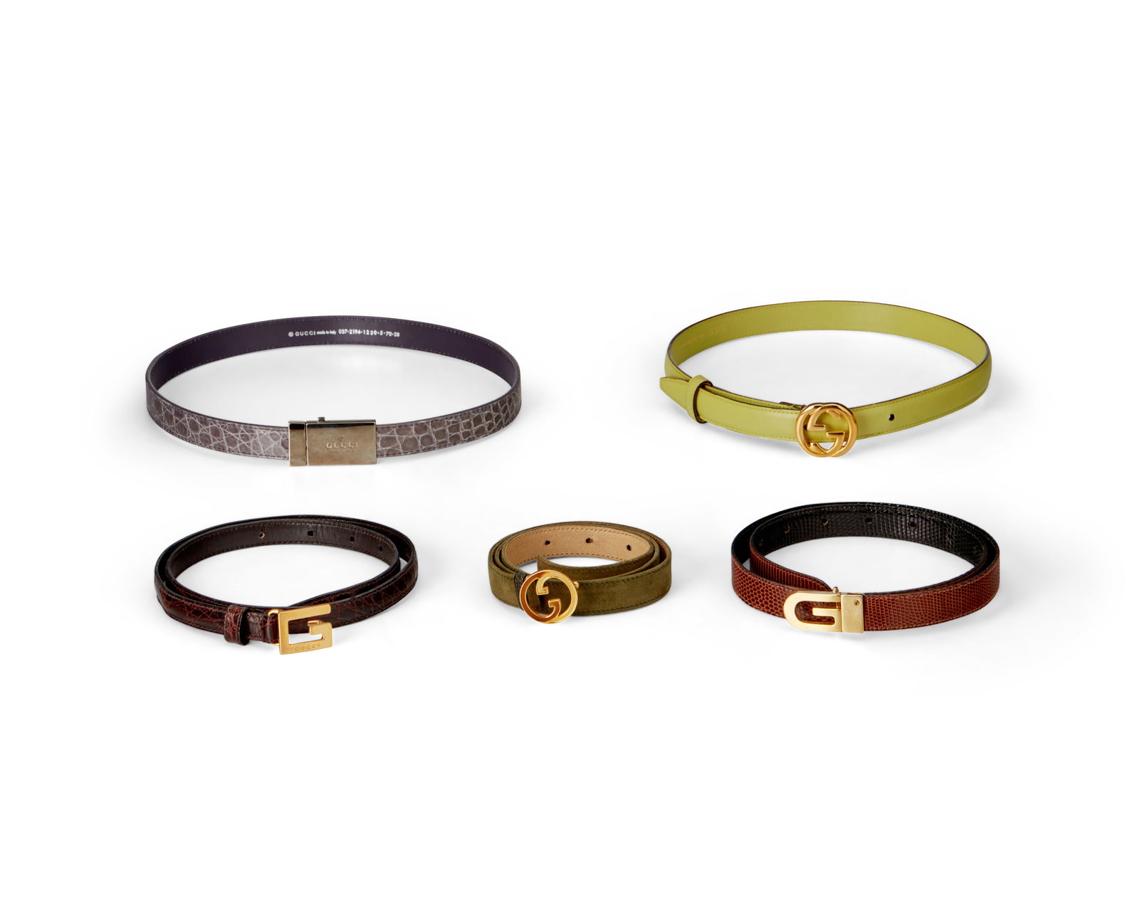 Gucci: A Group of Ladies Belts: Gucci: A Group of Ladies BeltsCirca 1980s-1990sEach marked for Gucci; variously marked: Made in Italy / 70/28 / 65/26 / serial numbersComprising five narrow belts with various buckles and in various l