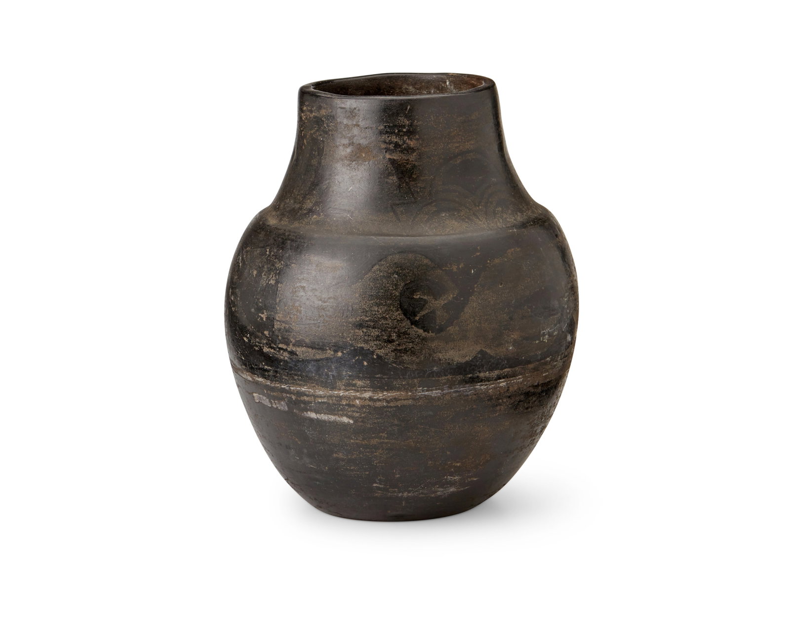Dolorita Tafoya (1923-1995), A blackware pottery jar, mid-20th century: Dolorita Tafoya (1923-1995) A blackware pottery jar, mid-20th century Incised to underside: Dolorita Tafoya / Santa Clara Pueblo The jar with black on black avanyu and banded cloud motifs 9" H x 