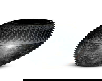 Maria Martinez and Popovi Da (1887-1980 and 1923-1971, San Ildelfonso Pueblo), A blackware pottery: Maria Martinez and Popovi Da (1887-1980 and 1923-1971, San Ildelfonso Pueblo)A blackware pottery bowl, circa 1960sSigned to underside: Maria / PopoviThe bowl with black on black banded feather motif t