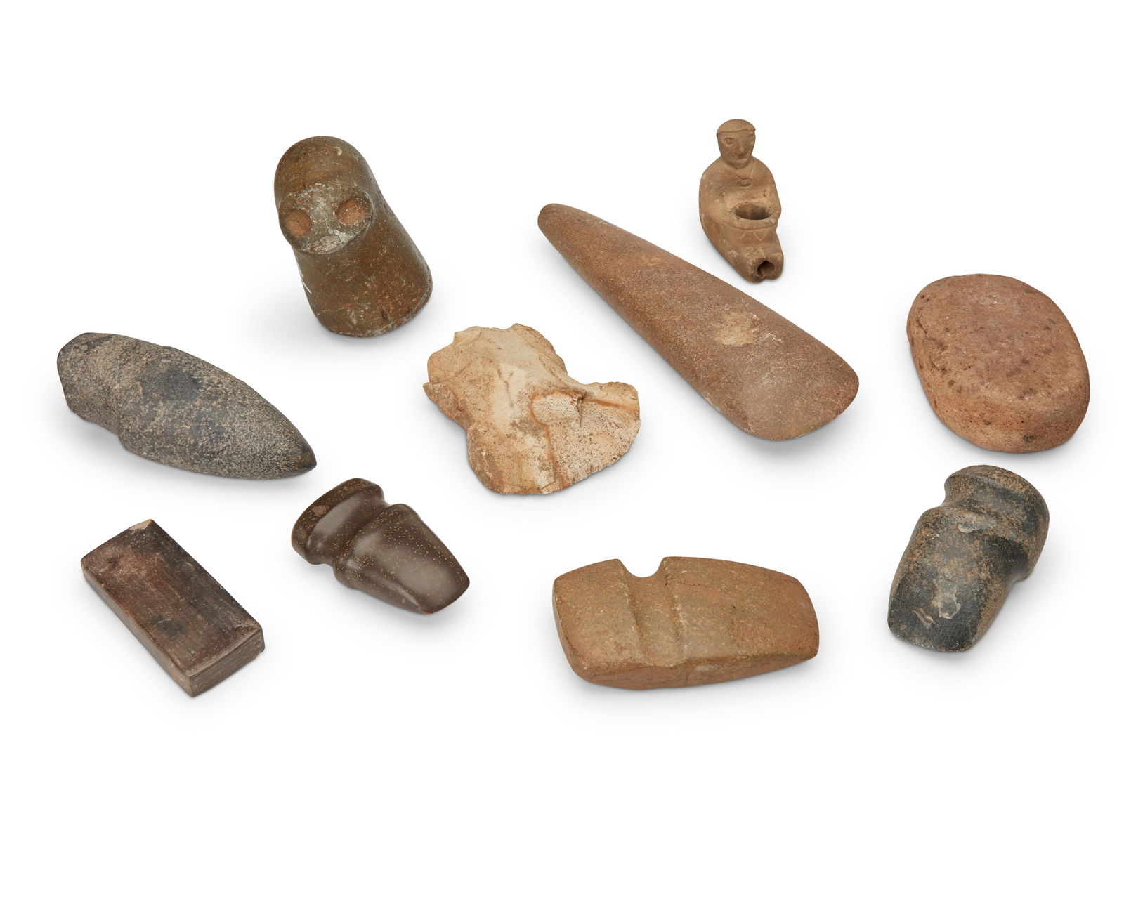 A group of carved stone implements (1 of 6)