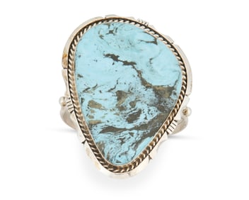 An Eddie Secatero Navajo sterling silver and turquoise cuff bracelet