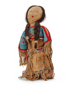 A Sioux beaded hide doll