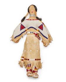A Sioux beaded hide doll