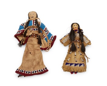 Two Sioux beaded hide dolls