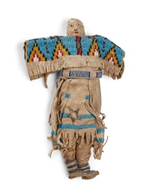 A Plains beaded hide doll