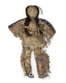 A Plains beaded hide doll
