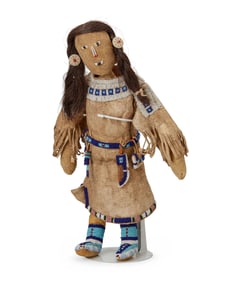 A Plains beaded hide doll