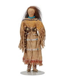 A Southern Plains beaded hide doll